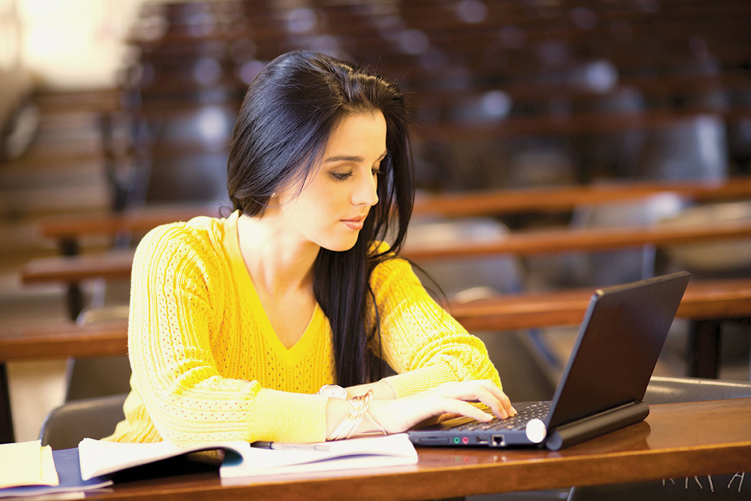 woman studying on computer