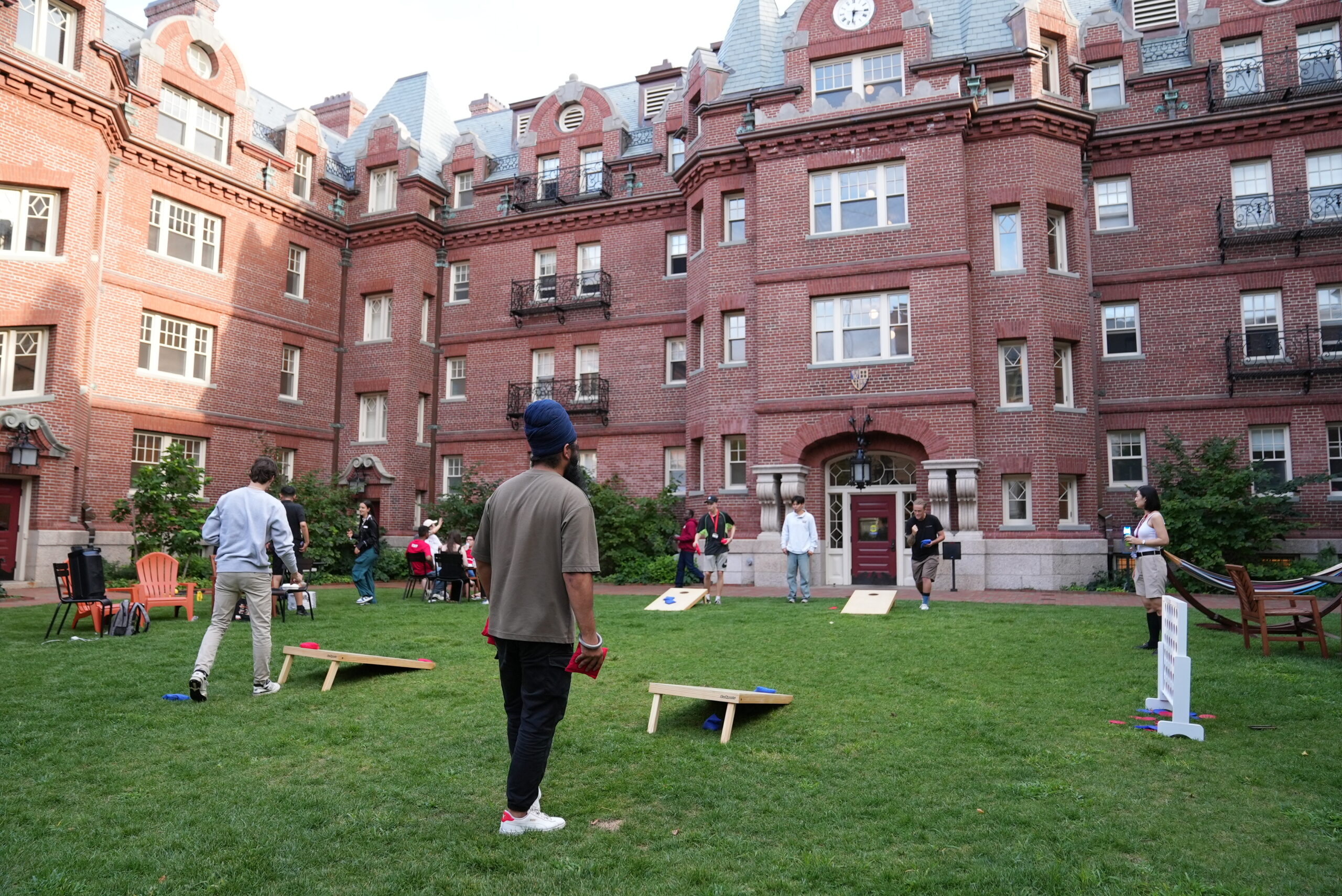 A group of students play lawn games.