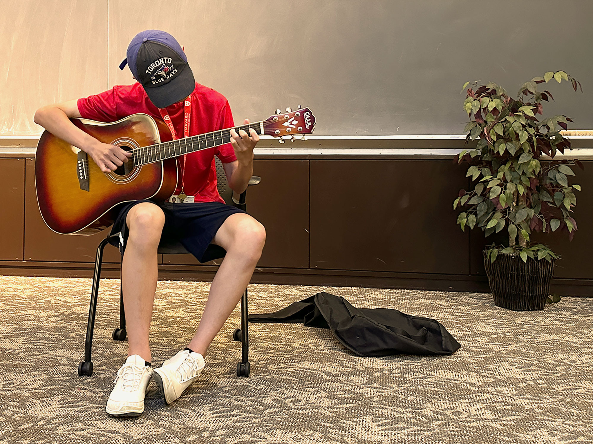 Talent show guitar performance.